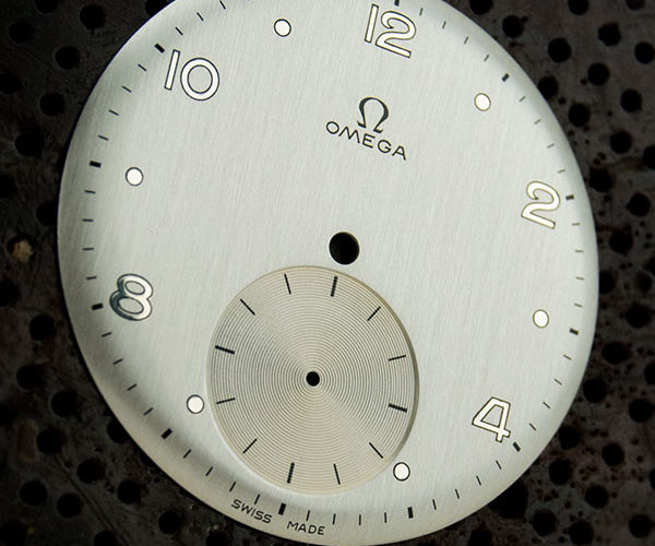 Restauración esfera de reloj Omega doble tono