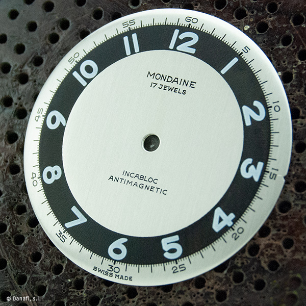 Restauración esfera de reloj Mondaine. Servicio técnico de relojería Mondaine.